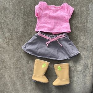 American Girl doll outfit. Includes top, skirt and boots. Fits 18in doll